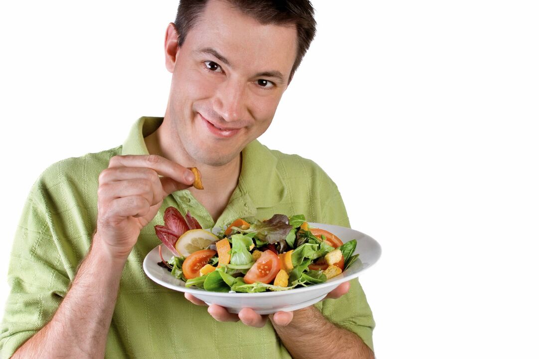 man eats vegetable salad for potency